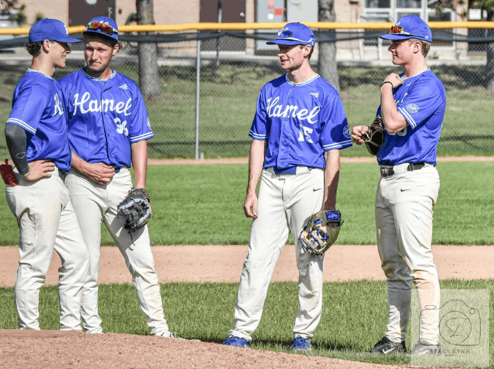 Hamel Hawks infield chats during a pitching change. photo credit: @staci_lynn_photos